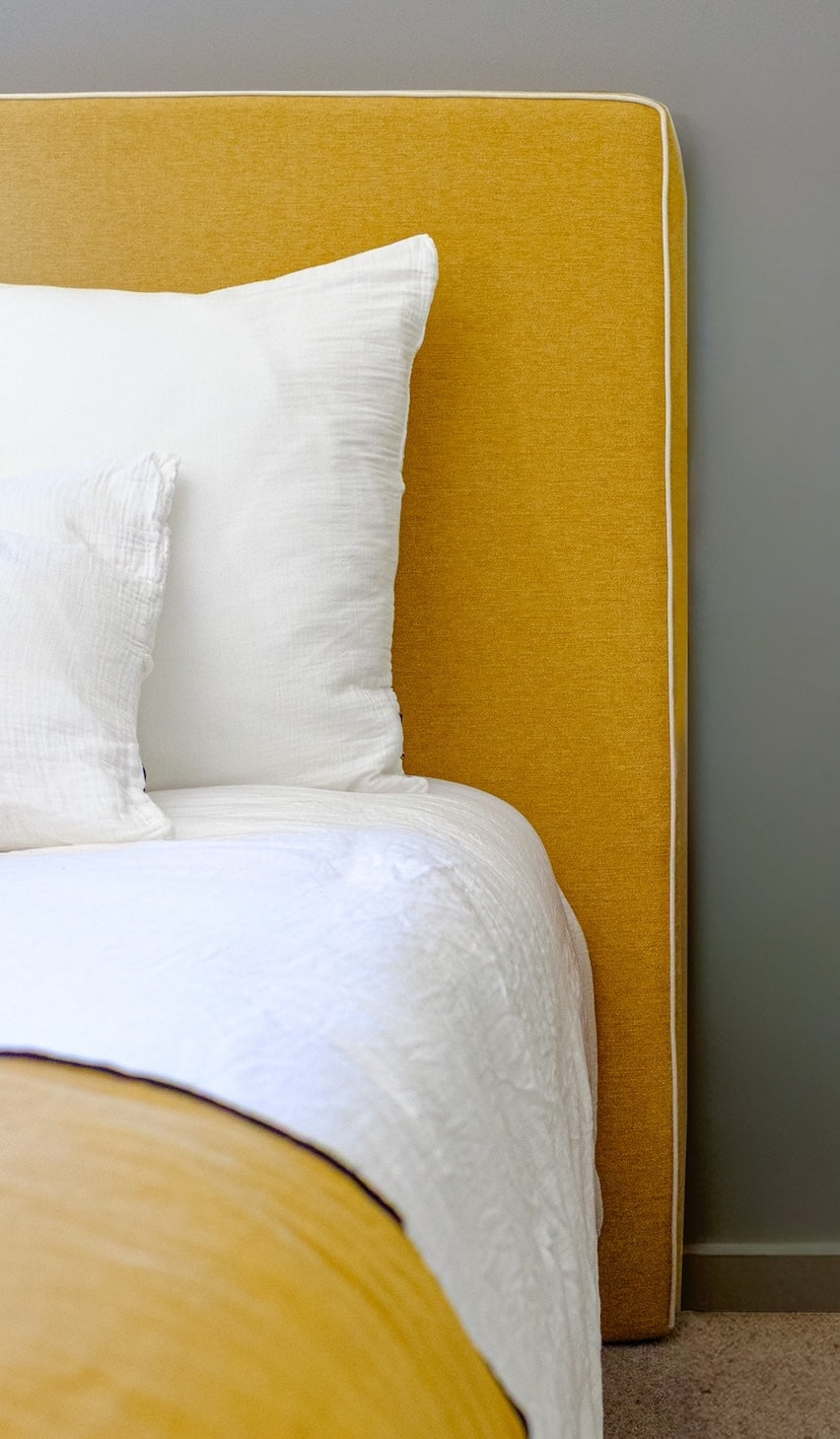 Quelle hauteur de tête de lit choisir pour une chambre élégante ?